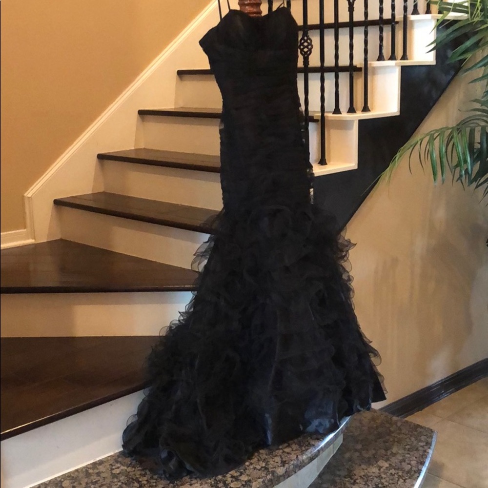 Black ruffled evening gown